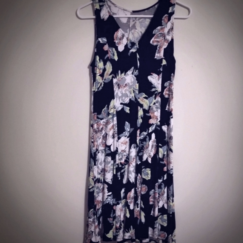 Black with multi-colored flower design, v-neck, stretchy midi length dress